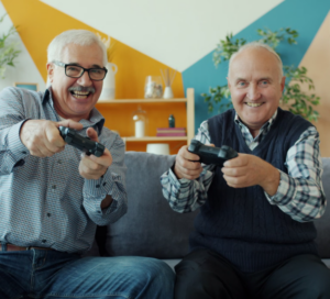 elderly-friends-playing-video-games-laughing.jpg
